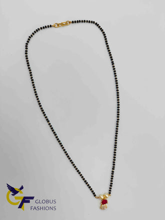 Small cz and ruby stones pendant with a single line black beads chain