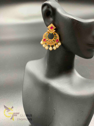 Cz stones and ruby stones with pearls chandbali earrings