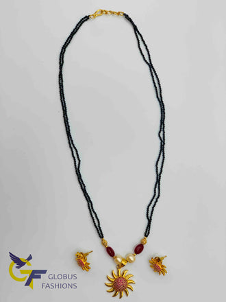 Black diamond beads chain with ruby stones pendant and earrings