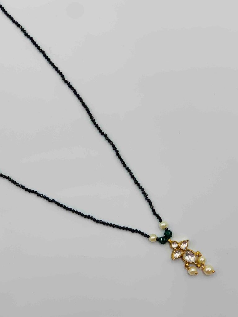 Single line black diamond beads chain with kundan stones pendant