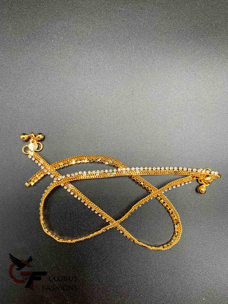 White Stones with gold anklets