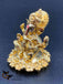 Flower design base with gold Ganesha idol