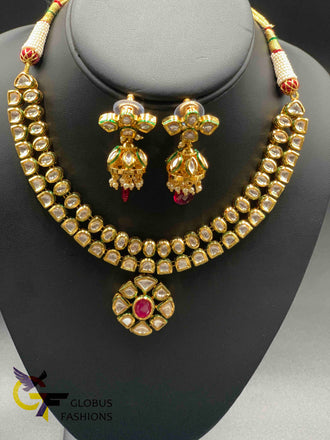 Traditional kundan stones with matching jumka earrings