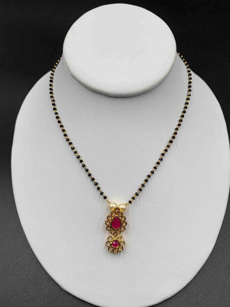 Black diamond beads with uncut cz stones pendant