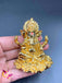 Flower design base with gold Ganesha idol