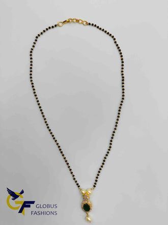 Emerald and cz stones pendant with a single line black beads chain