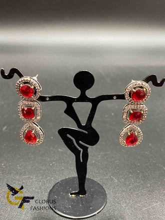 Oxidized German silver ruby and black stones earrings