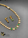 Kundan stones with emerald stones single line necklace