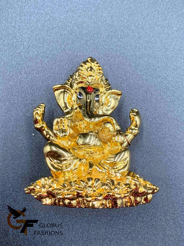 Flower design base with gold Ganesha idol
