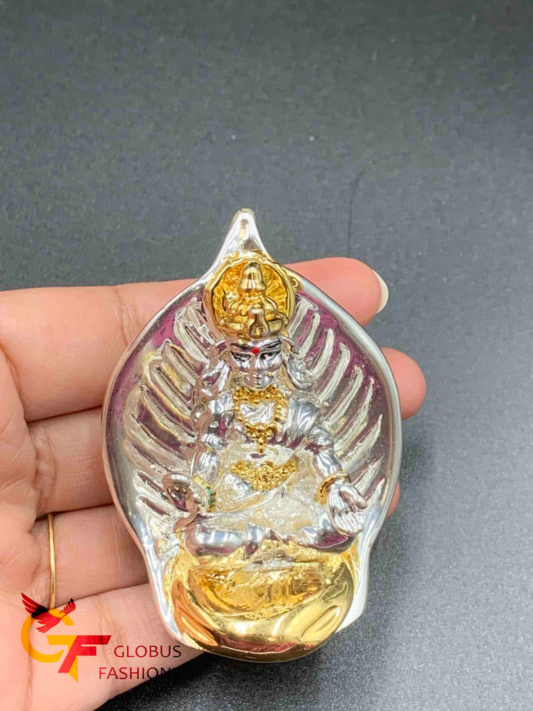 Beautiful leaf design back with silver Lakshmi Devi idol