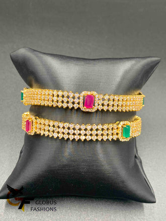 Cz stones and square-shaped ruby and emerald bangles