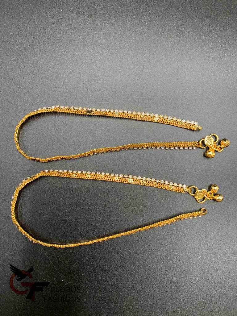 White Stones with gold anklets