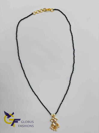 Single line black beads chain with kundan stones pendant