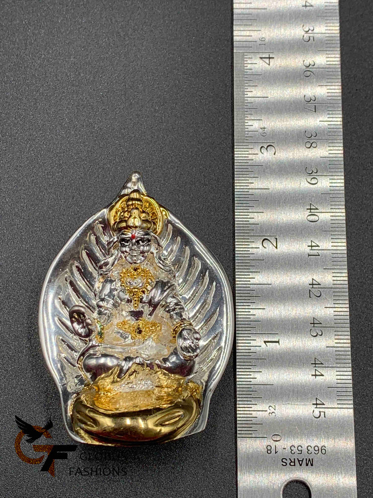 Beautiful leaf design back with silver Lakshmi Devi idol