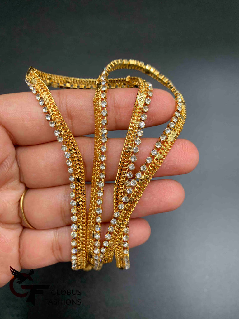 White Stones with gold anklets
