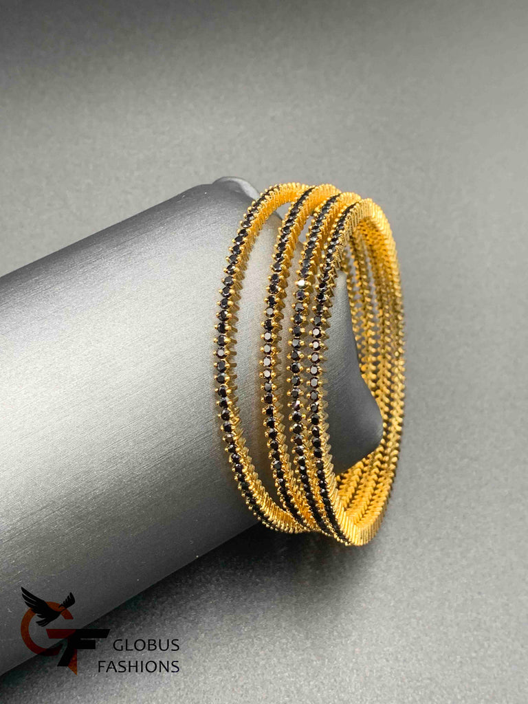 Small Black color stones set of four bangles