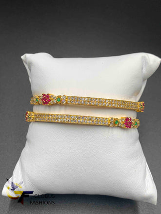 The multicolor stone flower design with cz stones set of two bangles