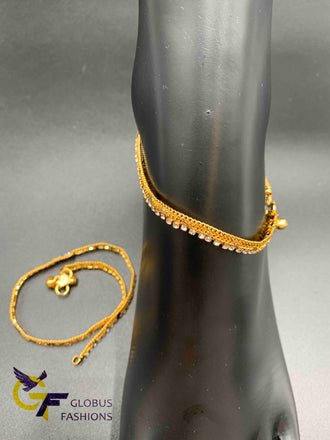 White Stones with gold anklets