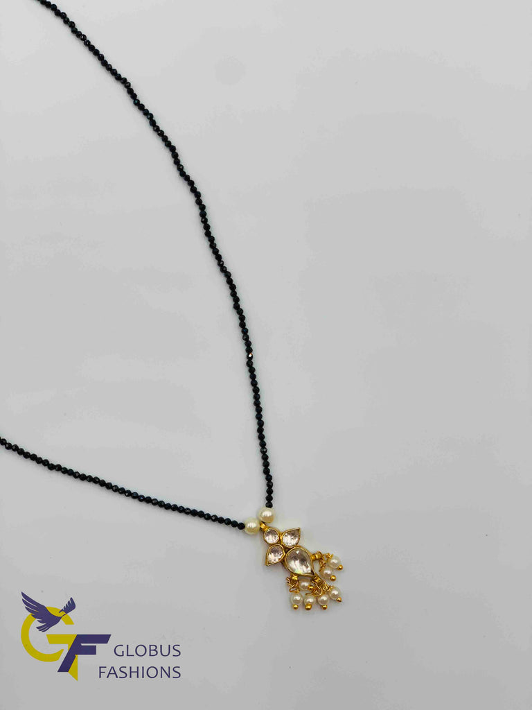 Single line black beads chain with kundan stones pendant