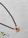 Traditional kundan and ruby stones with pearls pendant with black diamond beads chain