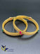 Cz stones and square-shaped ruby and emerald bangles
