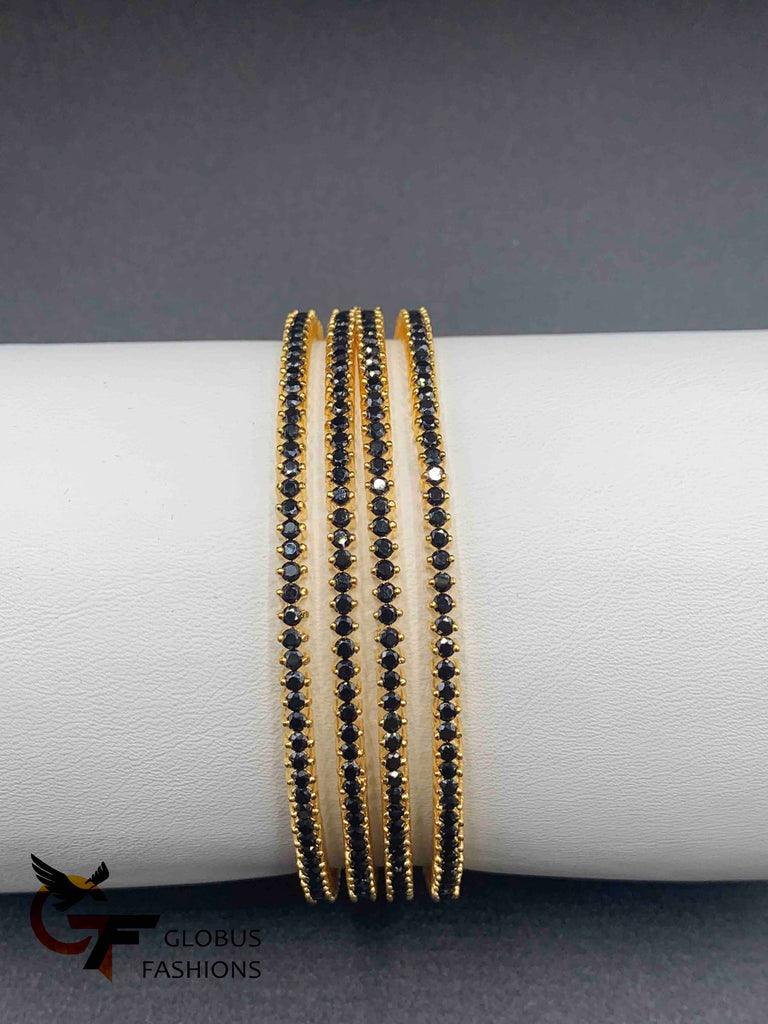 Small Black color stones set of four bangles