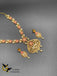 Beautiful peacock and flower design cz stones with ruby and pearls necklace set