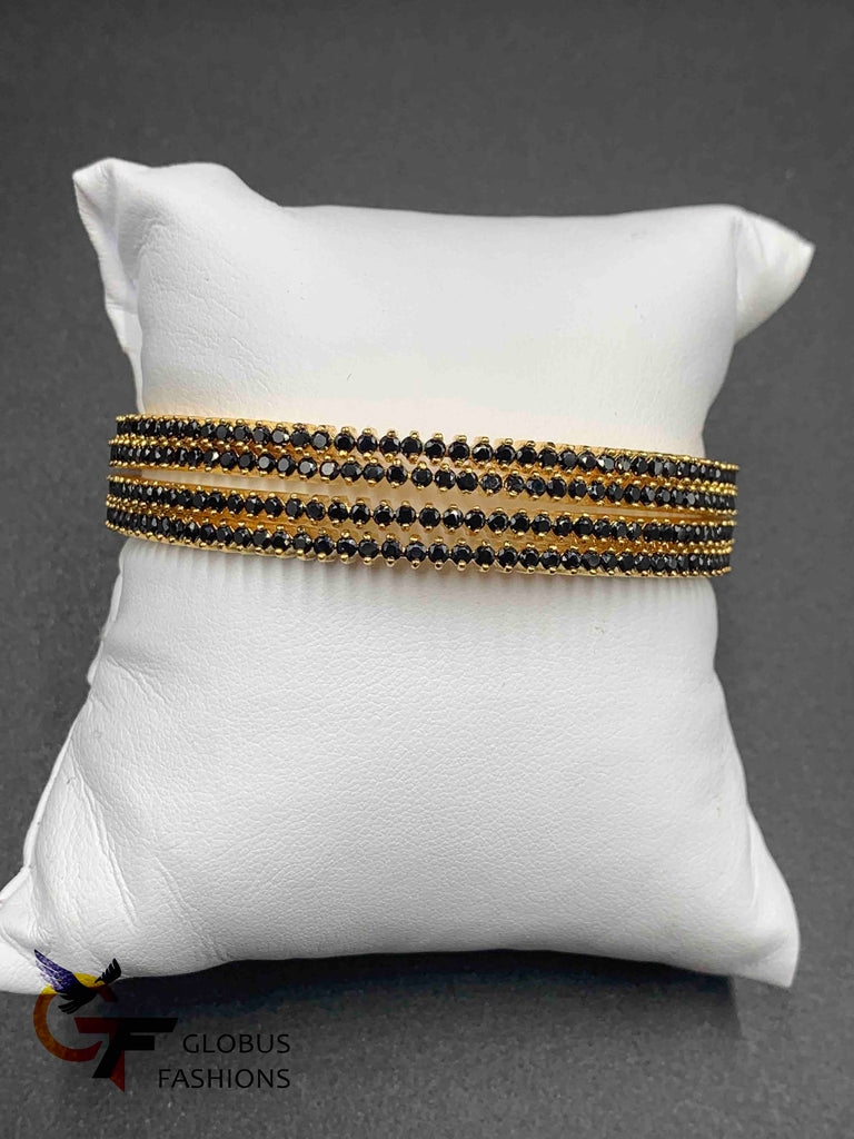 Small Black color stones set of four bangles