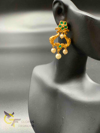 Traditional look emerald stones with pearls earrings