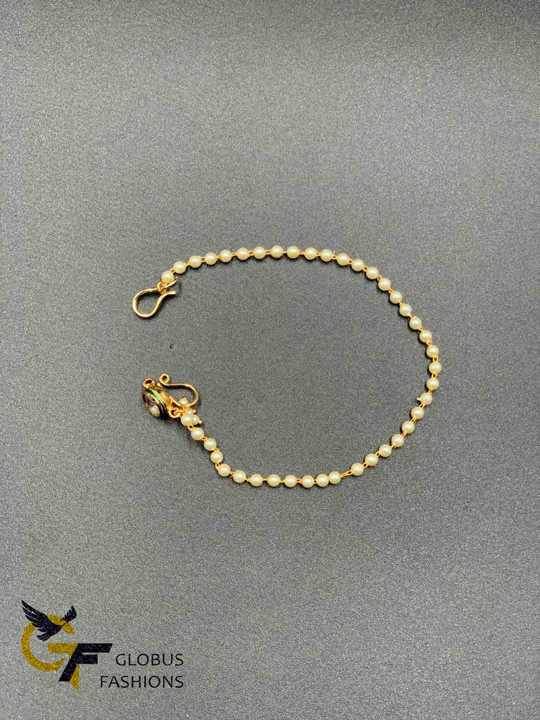 Single Kundan stone with connection pearls chain