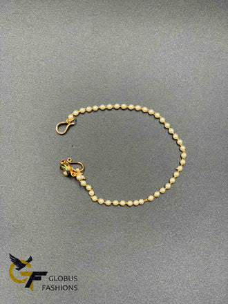 Single Kundan stone with connection pearls chain