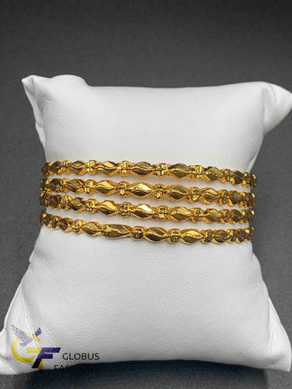 Set of four thick plain simple design bangles