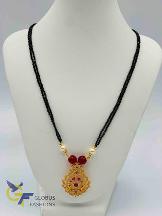 Cz stones and ruby stones pendant with black diamond beads chain